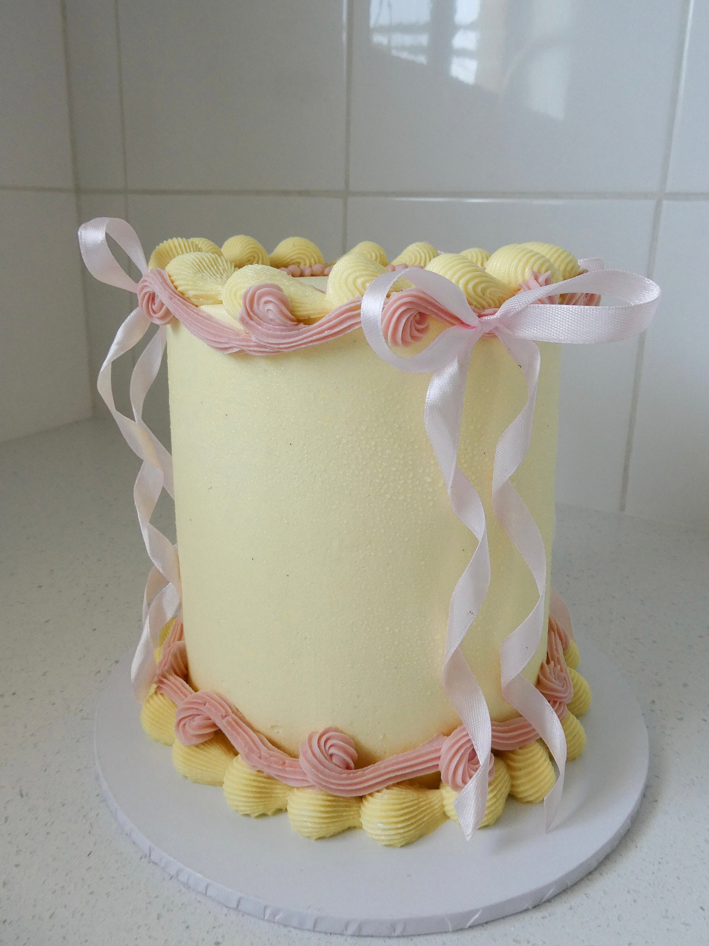 Pink and Yellow Vintage Bow Cake