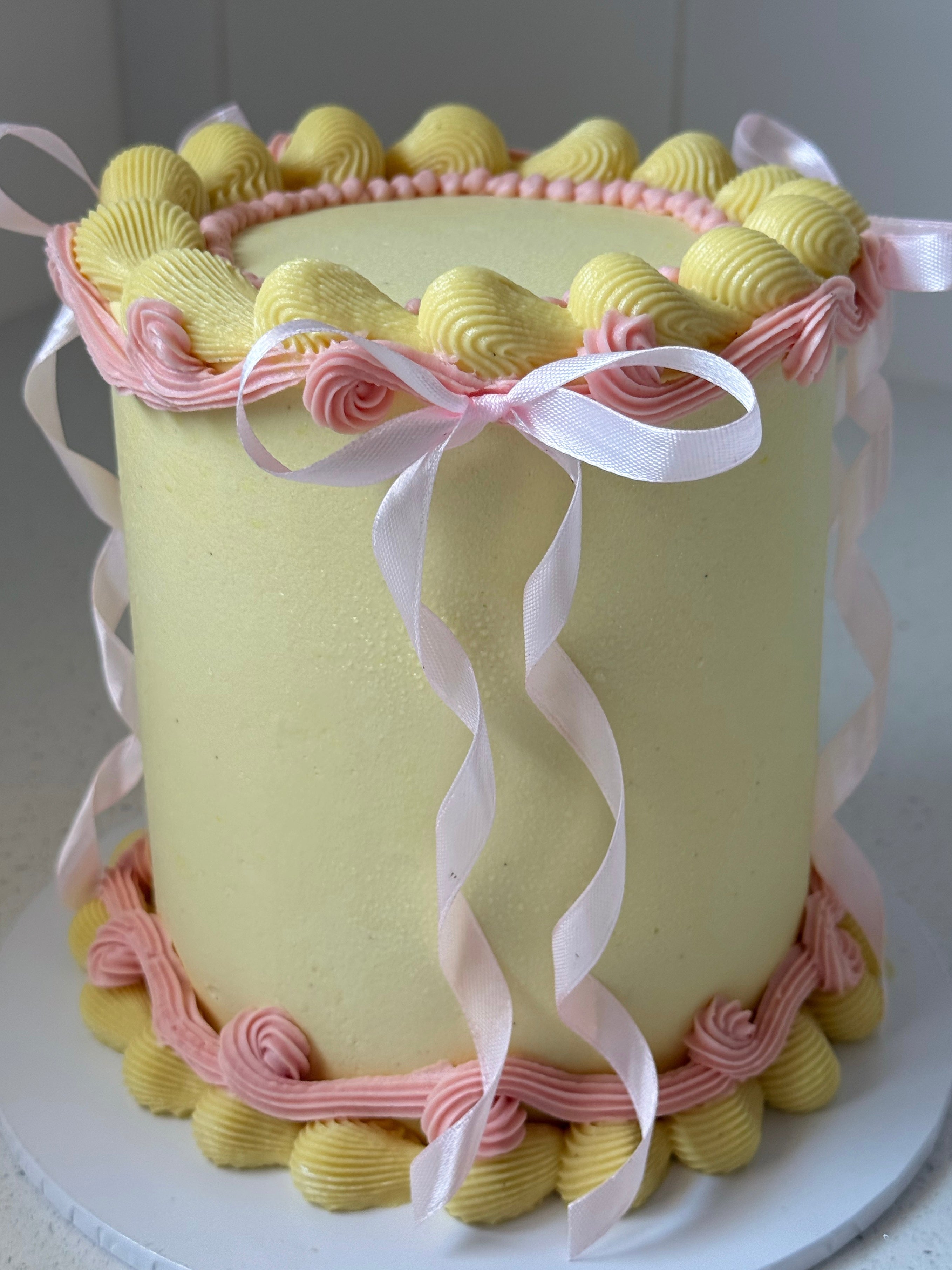 Pink and Yellow Vintage Bow Cake